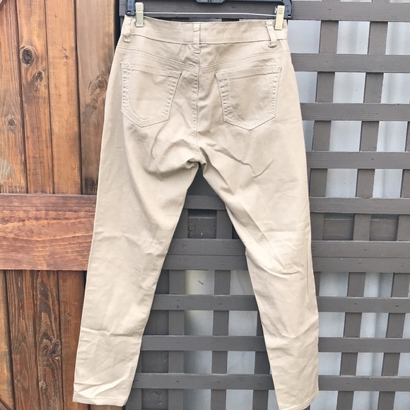 Khaki color skinny jeans with lots of stretch. Cute pockets in back. Never worn - Picture 2 of 4